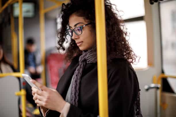 Young woman traveling by bus